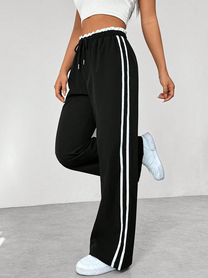 Hetty - High-waisted trousers