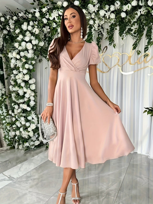 Chayen – Elegante zomerjurk met V-hals pofmouwen en aansluitende taille